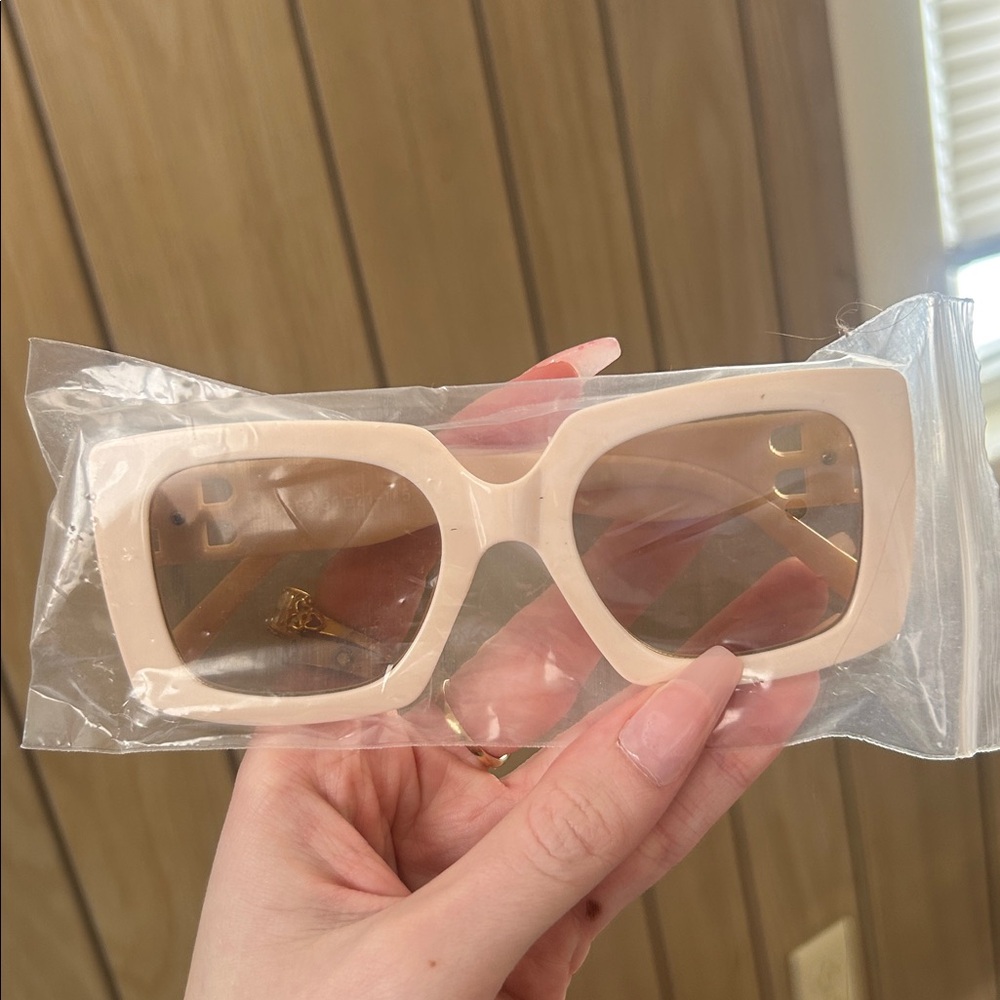 Cream sunglasses with gold accents - Picture 2 of 3